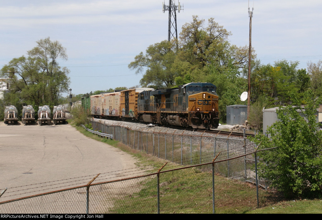 Just in to its trip to Detroit, L303 rolls through Seymour